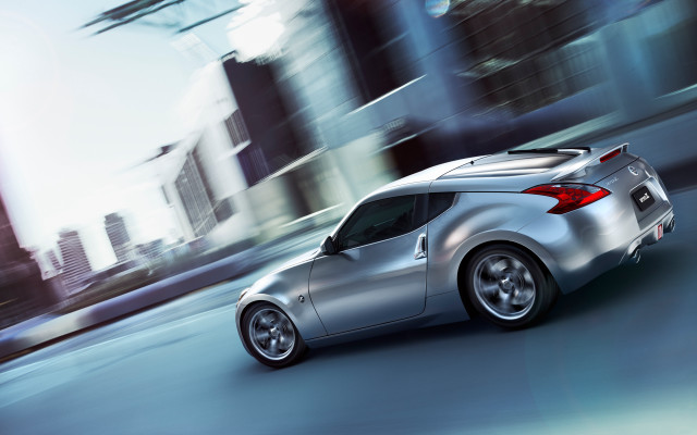 Silver sports car city street free wallpaper for desktop - medium preview image