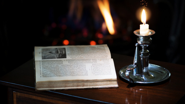 Lit candle table book arts free wallpaper for desktop - medium preview image