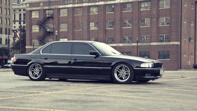 Black car parking lot fire free wallpaper for desktop - medium preview image