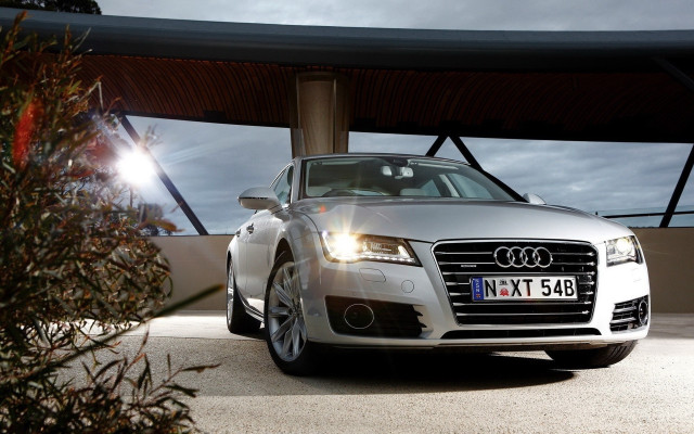 Silver car covered structure sky free wallpaper for desktop - medium preview image