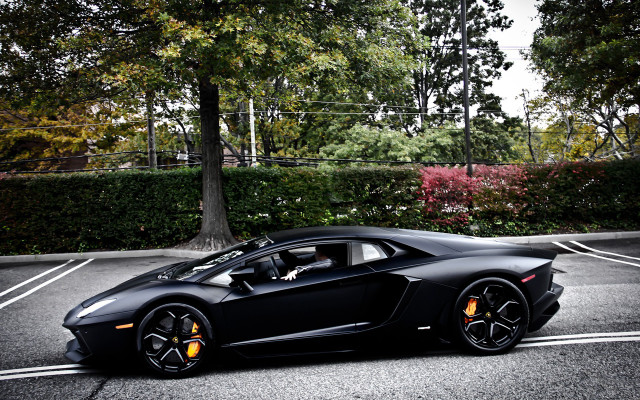 Black sports car parking lot #38 free wallpaper for desktop - medium preview image