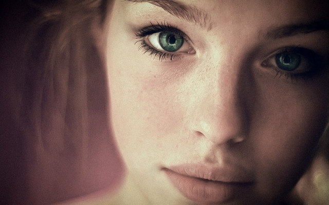 Woman blueeyes serious closeup photorealistic free wallpaper for desktop - medium preview image