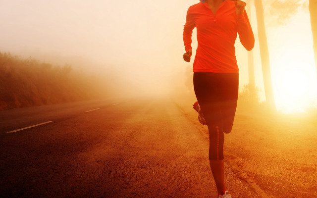 Woman running foggy day sunset free wallpaper for desktop - medium preview image