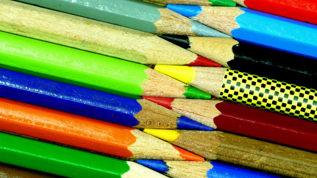 Colored pencils closeup black background free wallpaper for desktop - medium preview image