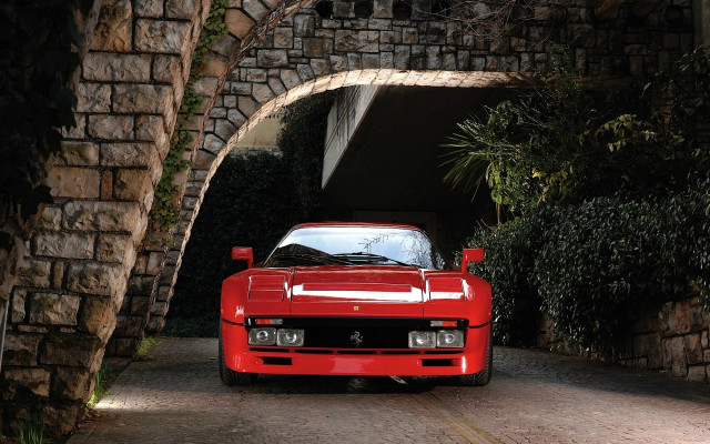 Red sports car tunnel bridge free wallpaper for desktop - medium preview image