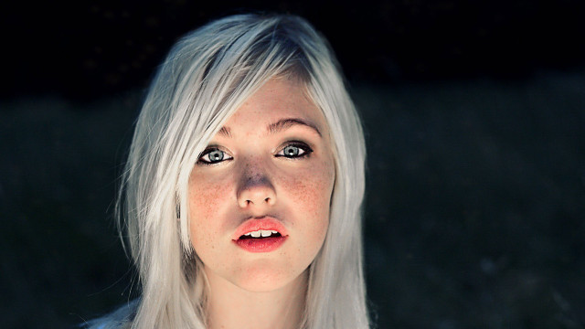 White hair freckled portrait looking free wallpaper for desktop - medium preview image