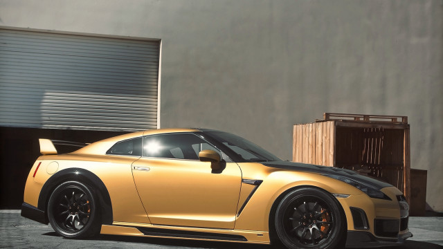 Yellow sports car garage roller free wallpaper for desktop - medium preview image