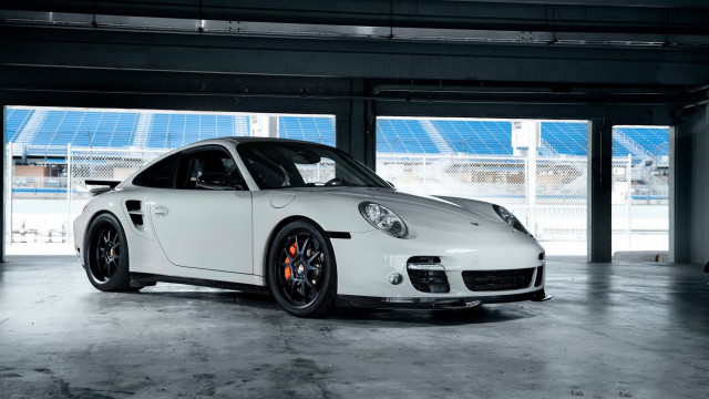 White porsche garage blue sky free wallpaper for desktop - medium preview image