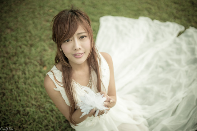 Woman white dress grass feather free wallpaper for desktop - medium preview image