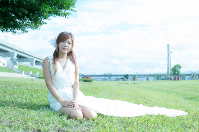 Woman sitting grass white dress free wallpaper for desktop - medium preview image
