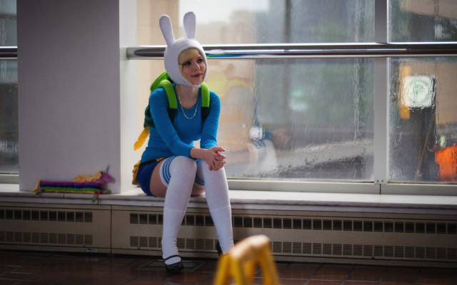 Bunny costume sitting window sill free wallpaper for desktop - medium preview image