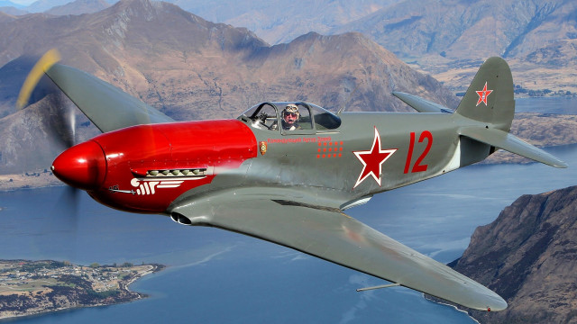 Red silver plane flying mountains free wallpaper for desktop - medium preview image