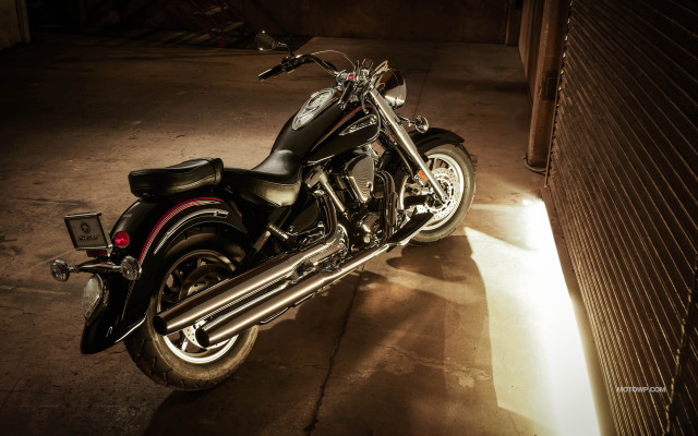 Motorcycle garage light shining detailed free wallpaper for desktop - medium preview image