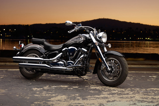 Motorcycle parked road water night free wallpaper for desktop - medium preview image