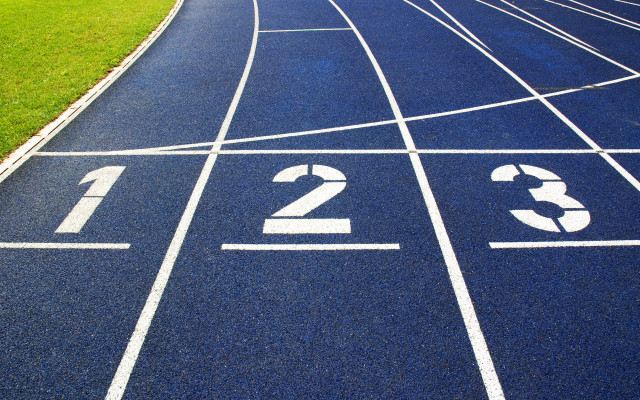 Running track numbers grass night free wallpaper for desktop - medium preview image