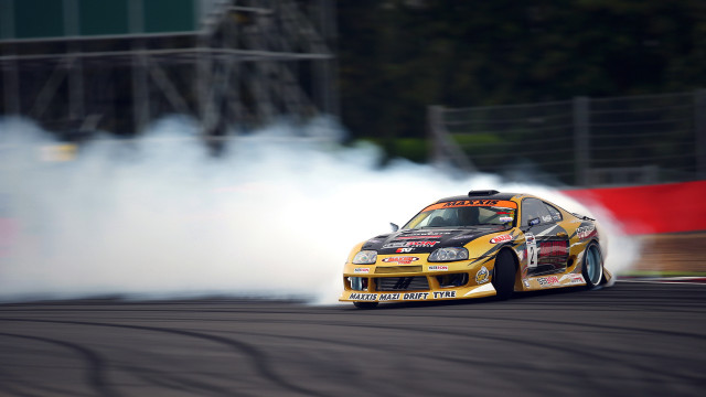 Smoke racecar tiltshift precisionism blurry free wallpaper for desktop - medium preview image