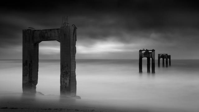 Pier ocean pillar cloudy sky free wallpaper for desktop - medium preview image