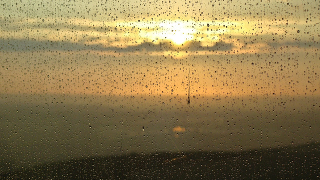 Sunset rainy window cellphone tower free wallpaper for desktop - medium preview image