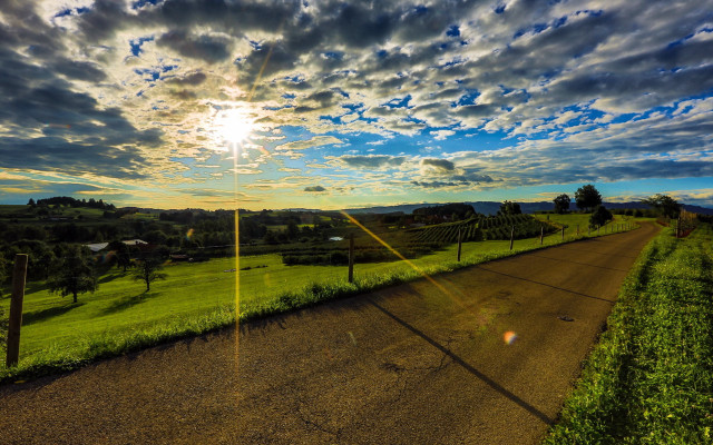 Road field fence sky clouds free wallpaper for desktop - medium preview image