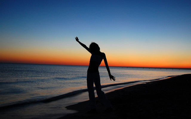 Woman beach sunset outstretched arms #2 free wallpaper for desktop - medium preview image