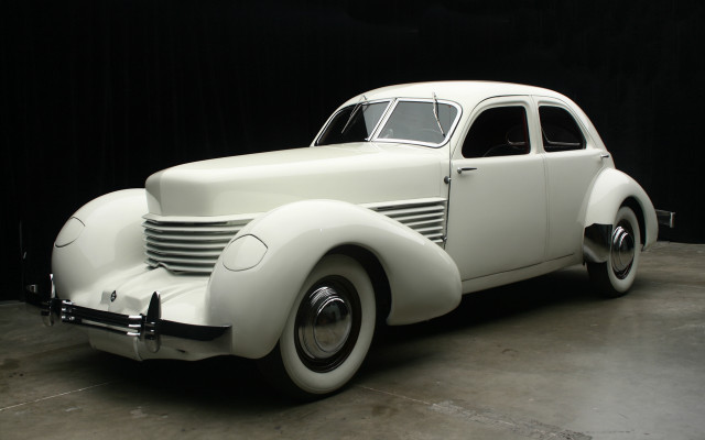 White car garage black background free wallpaper for desktop - medium preview image