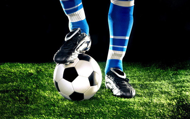 Soccer player blue white kicking free wallpaper for desktop - medium preview image