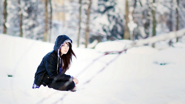 Woman squatting snow trees fence free wallpaper for desktop - medium preview image