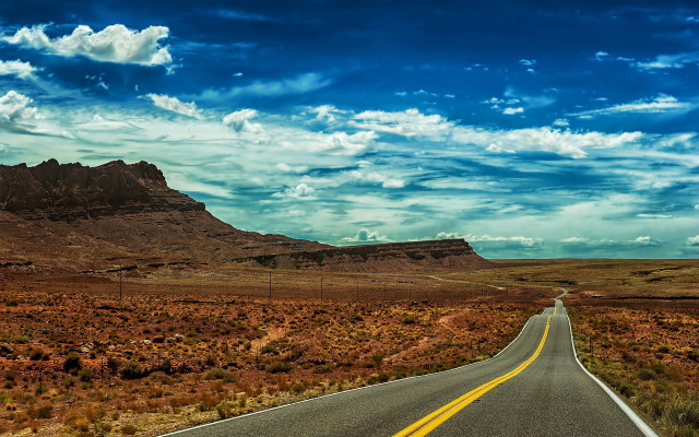 Mountain road ocean sky clouds free wallpaper for desktop - medium preview image