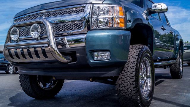 Large truck parking lot clouds free wallpaper for desktop - medium preview image