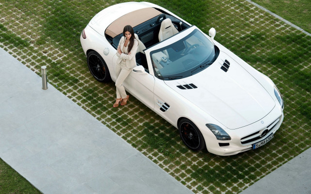 Woman white sportscar driveway grass free wallpaper for desktop - medium preview image