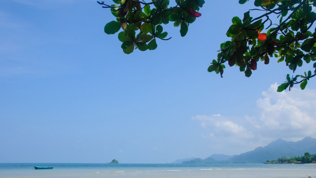 Boat beach mountains sky clouds free wallpaper for desktop - medium preview image