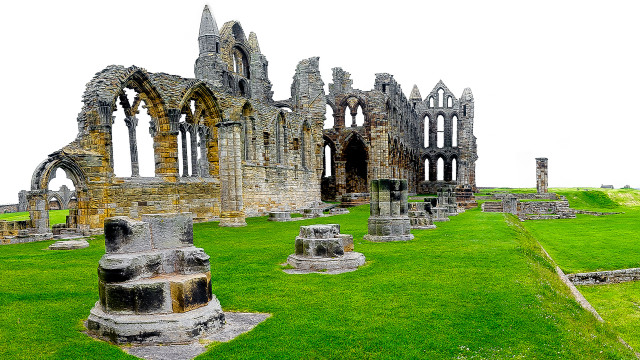 Grassy field ruins tiltshift gothic free wallpaper for desktop - medium preview image