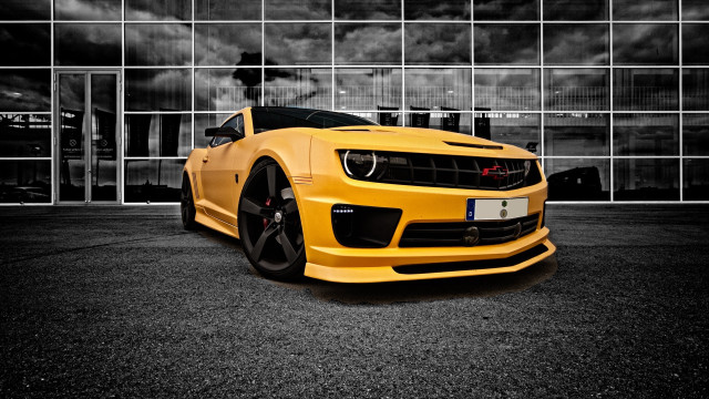 Yellow sports car building cloudy #3 free wallpaper for desktop - medium preview image