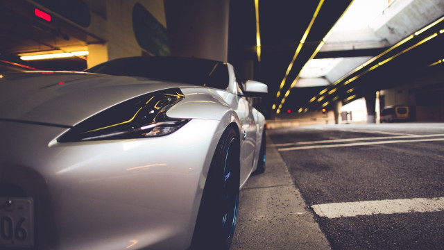 White sports car parking garage #6 free wallpaper for desktop - medium preview image