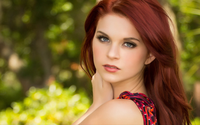 Red haired woman park bokeh #2 free wallpaper for desktop - medium preview image