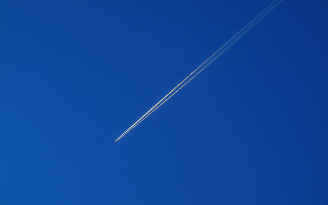 Jet blue sky contrail precisionism free wallpaper for desktop - medium preview image