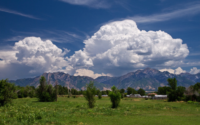 Mountain field trees clouds sky free wallpaper for desktop - medium preview image