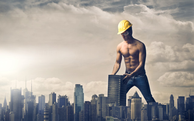 Man hat building ledge city free wallpaper for desktop - medium preview image