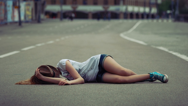 Woman laying street denim shorts free wallpaper for desktop - medium preview image