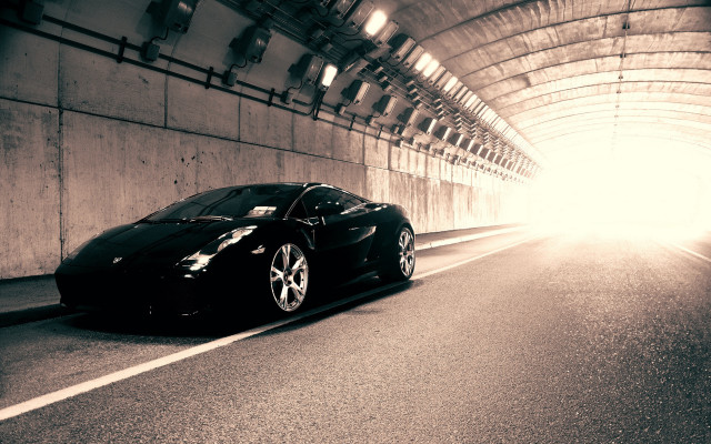 Black sports car tunnel sunlight free wallpaper for desktop - medium preview image