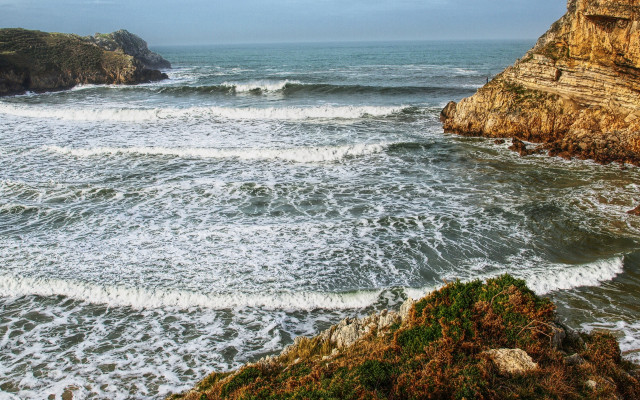 Wave riders beach cliff ocean free wallpaper for desktop - medium preview image