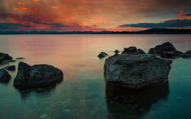 Sunset lake rocks clouds horizon free wallpaper for desktop - medium preview image