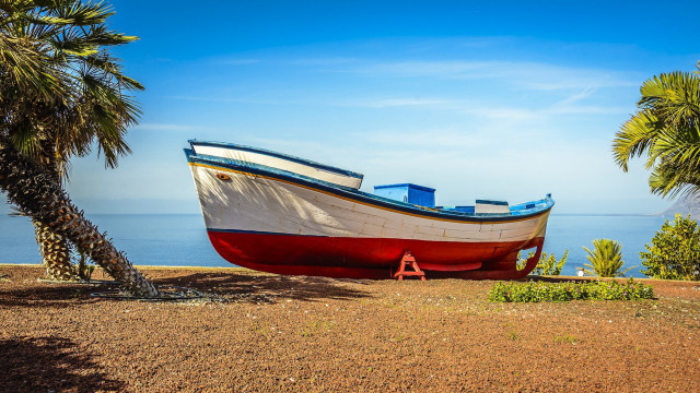 Boat beach palm ocean sky #2 free wallpaper for desktop - medium preview image