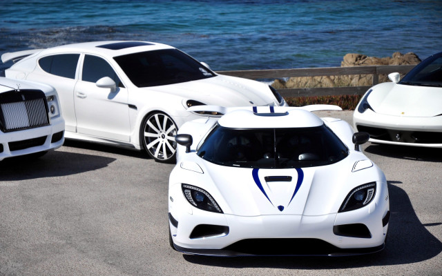 Three white sports cars ocean free wallpaper for desktop - medium preview image