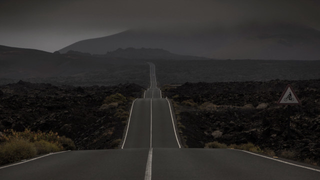 Desolate road mountains sky forest free wallpaper for desktop - medium preview image