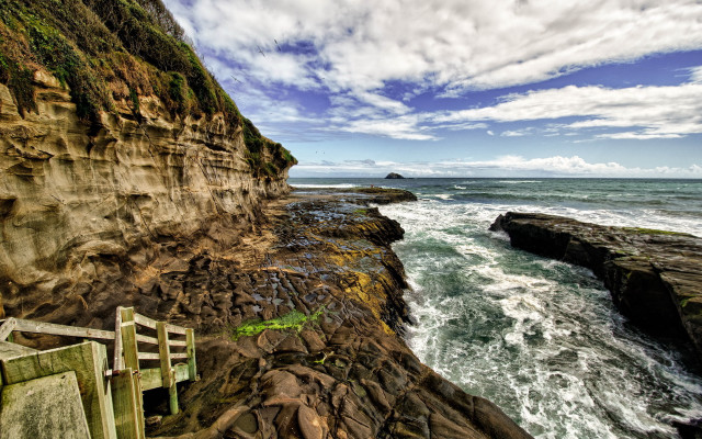 Rocky cliff wooden gate ocean free wallpaper for desktop - medium preview image