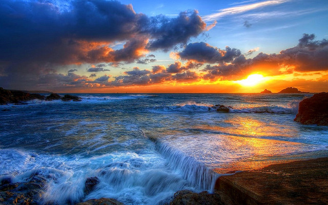 Sunset ocean waves rocks foreground free wallpaper for desktop - medium preview image