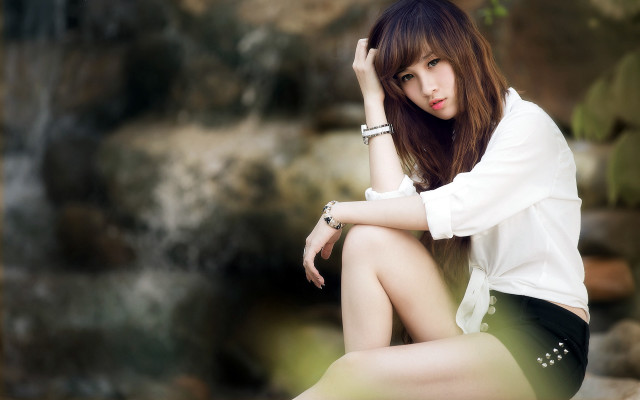 Woman rock waterfall bokeh jewelry free wallpaper for desktop - medium preview image