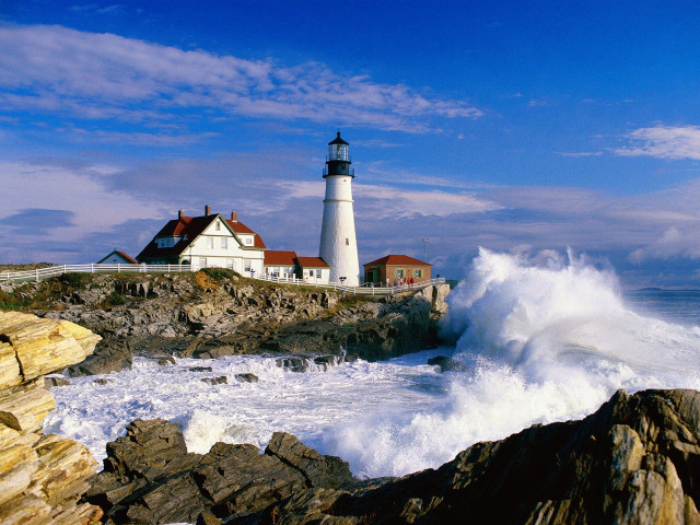 Lighthouse rocky shore wave cliff free wallpaper for desktop - medium preview image