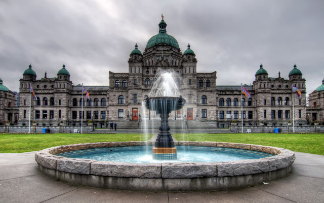 Large building fountain cloudy sky free wallpaper for desktop - medium preview image